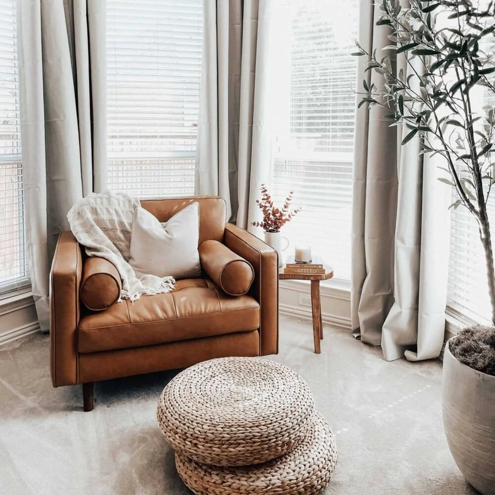 A clean, inviting accent chair stands ready for styling tips and frequently asked questions.