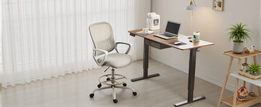 A hand adjusts the lever on an office chair to improve seating ergonomics.