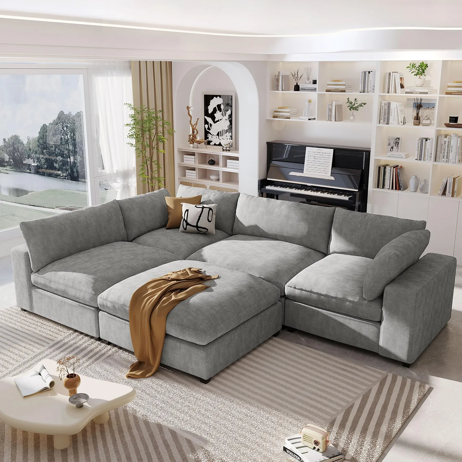 A measuring tape lies across a sectional sofa to ensure proper delivery dimensions.