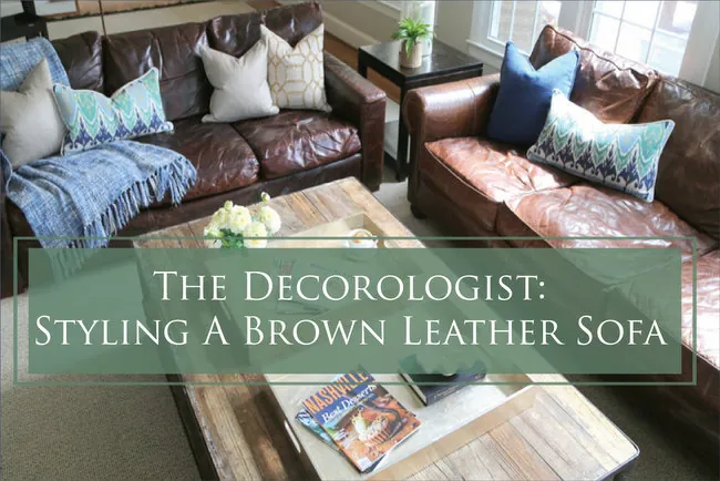 Adding light cream covers and a textured blanket to update a dark brown sofa.