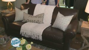 How to Brighten Up a Brown Couch With Textiles and Decor
