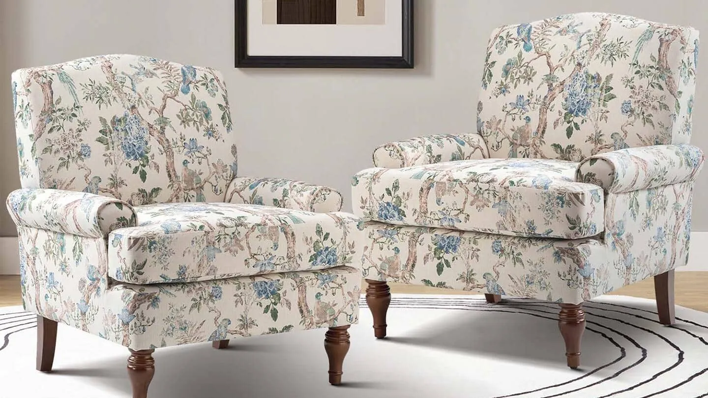 A durable leather club chair positioned in a cozy, professional home office space.