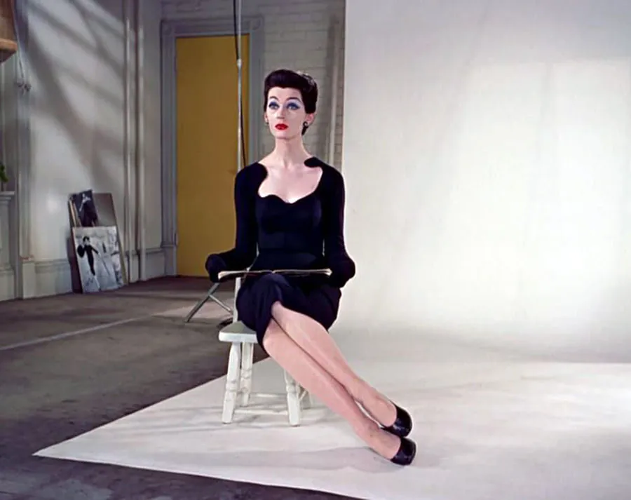 Graceful hand placement is essential when learning how to sit like a model.