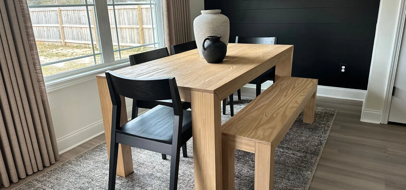 Measuring the clearance around a dining table to ensure comfortable movement in a room.