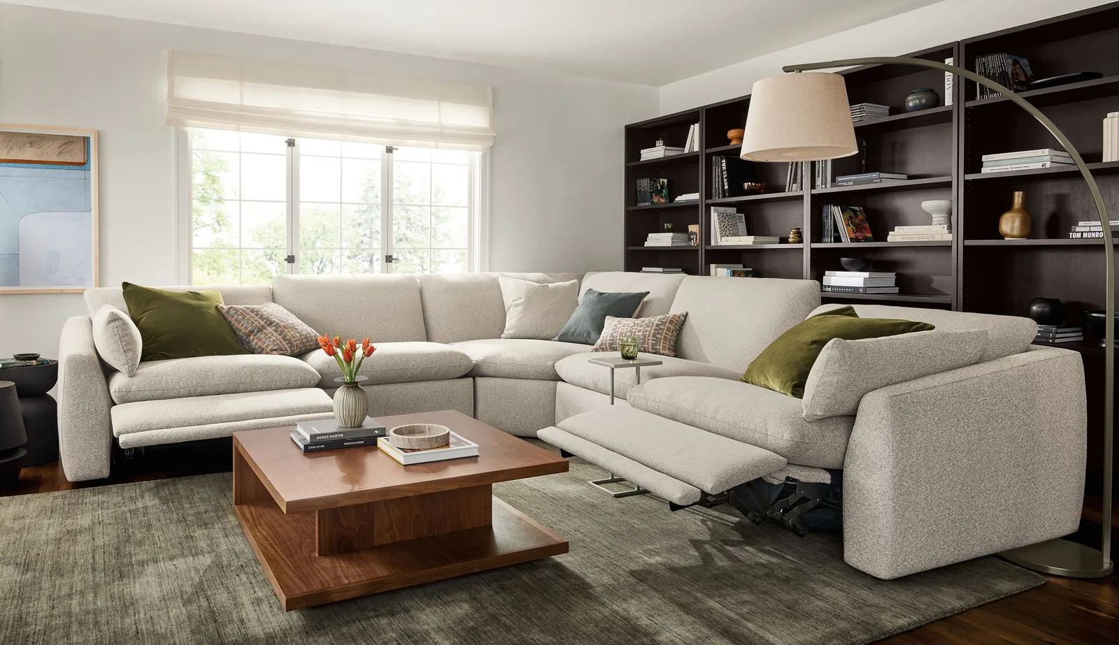 A modular sectional sofa fits perfectly in the corner of a compact modern apartment.