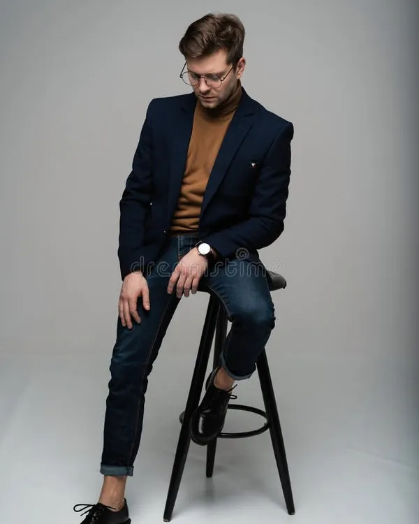 Person maintaining a slim profile and straight spine while sitting on a chair.