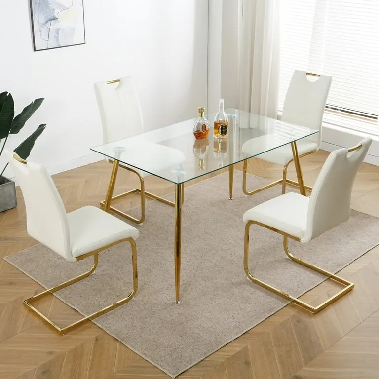 Sleek metal dining chairs placed in a narrow, modern kitchen space.