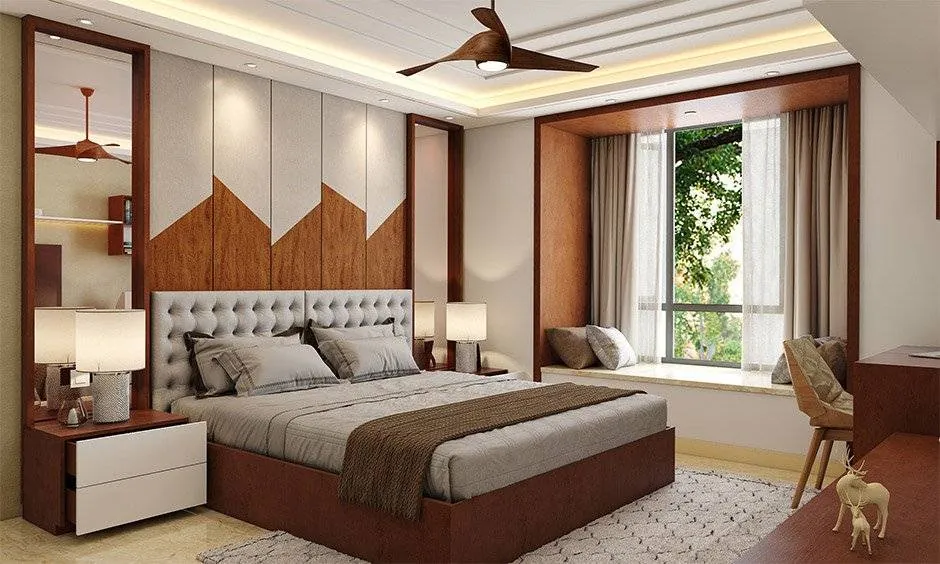 A storage ottoman and a folding chair providing seating in a small bedroom.
