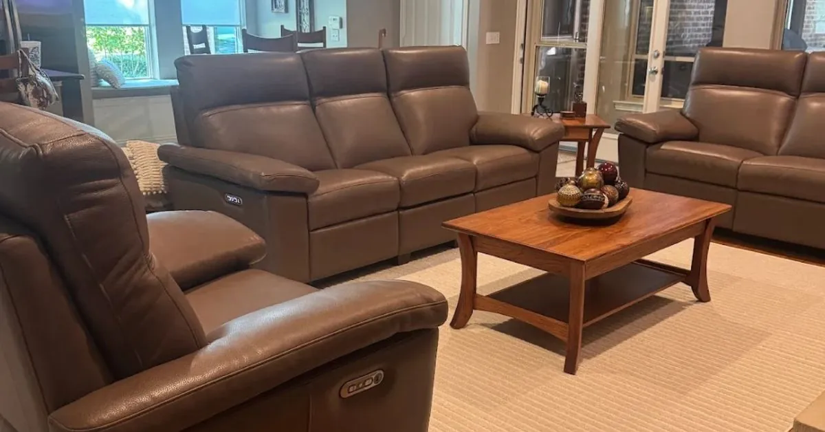 A tactile bouclé accent chair placed next to a linen sofa for texture contrast.
