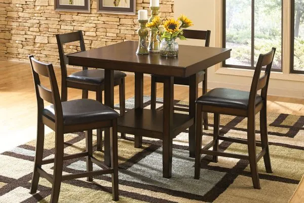 Visible cracks in a wooden table leg caused by improper storage conditions.